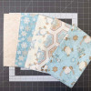 Flannel Sn'Gnomies pillow cover kit fabrics in icy blue, cream, and winter gnome prints