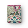 Exotic Splendour fabric pack folded with teal and magenta botanical prints