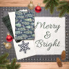 Merry & Bright quilt kit fabrics with holiday ornaments and pattern panel