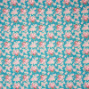 Mon Cheri fat quarter fabric with small pink floral clusters on teal