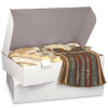 Open extra-large PROP-IT storage chest holding folded quilts and textiles