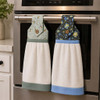 Meadow Song fabric bundle shown as two finished hanging kitchen towels