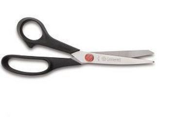 Black-handled 8.5-inch dressmaker shears on white background