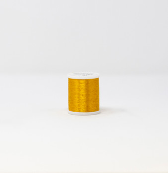 Madeira FS Metallic Gold 5 thread spool on white background