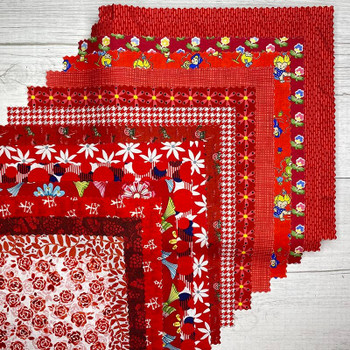 Stack of Red 10-inch precut fabric squares