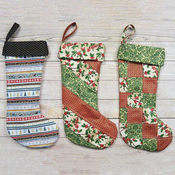 Three finished Christmas stockings in coordinating holiday prints