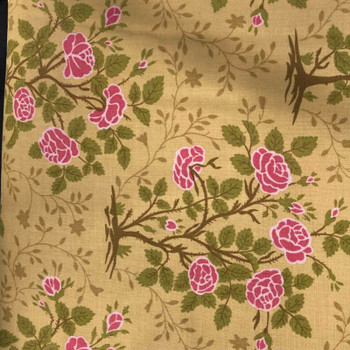 RJR Garden Gate tan fabric with pink rose bushes and green leaves