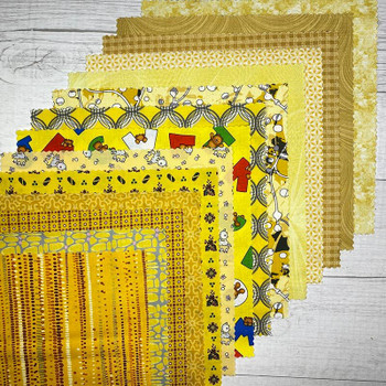 Stack of Yellow 10-inch precut fabric squares