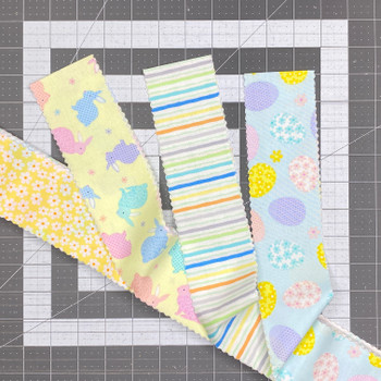 Happy Easter 2.5-inch fabric strips in pastel bunny, egg, stripe, and floral prints