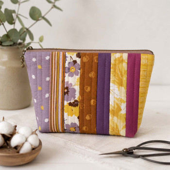 Autumn Amethyst fabric bundle sewn into a striped zippered pouch