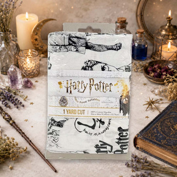 Harry Potter one-yard fabric cut packaged with black character print on white