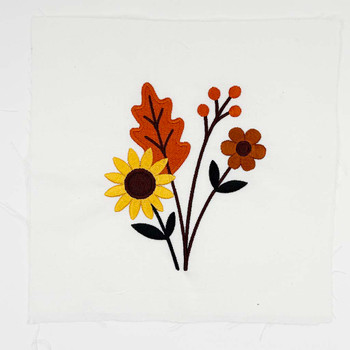 Fall wildflower embroidery with sunflower, oak leaf, berries, and stems