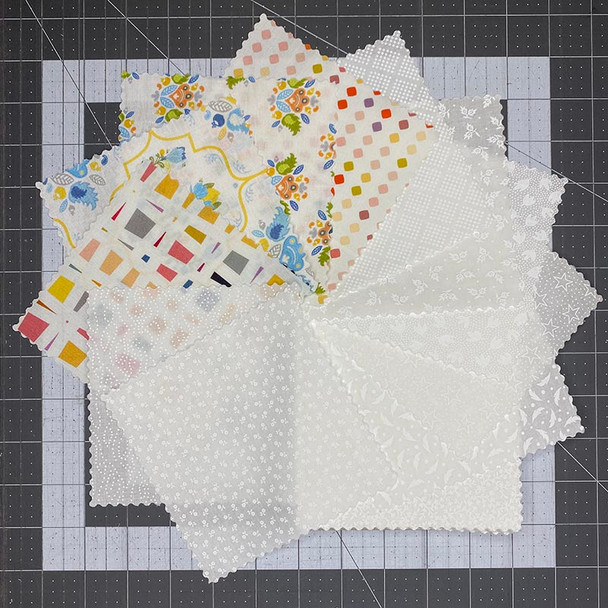Stack of Color Story five-inch precut fabric squares style SNS-5SQ-WHITE