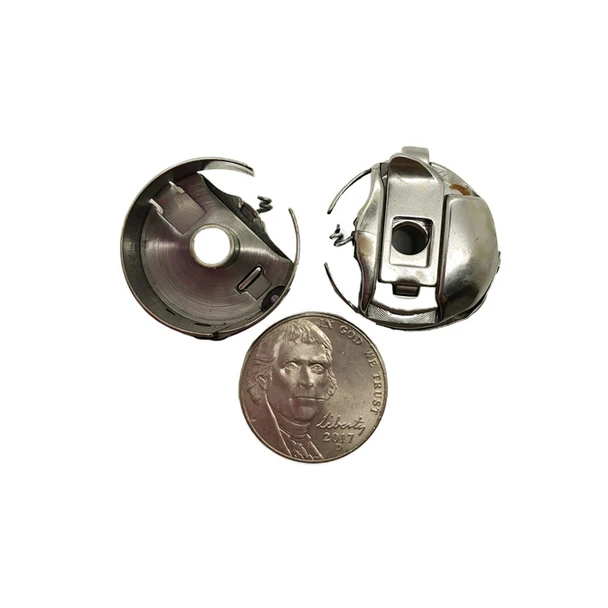 Bobbin Case - Style L product shown for scale and identification