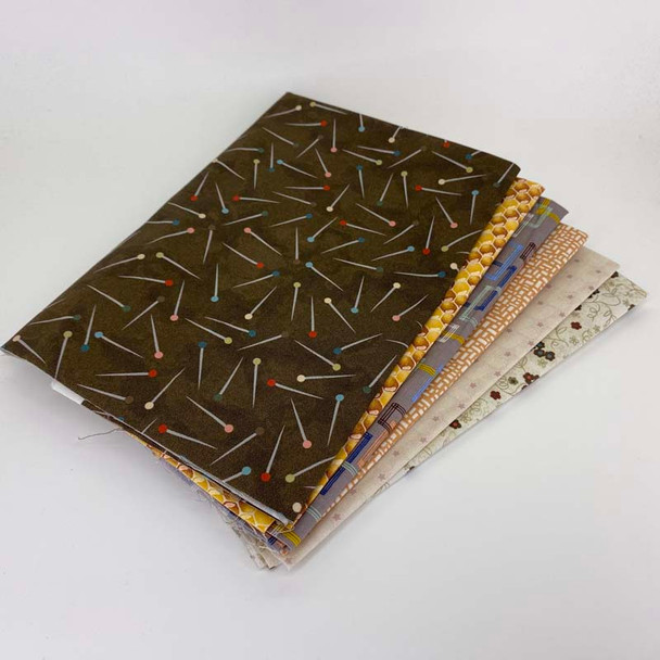 Folded Brown fat quarter fabric bundle