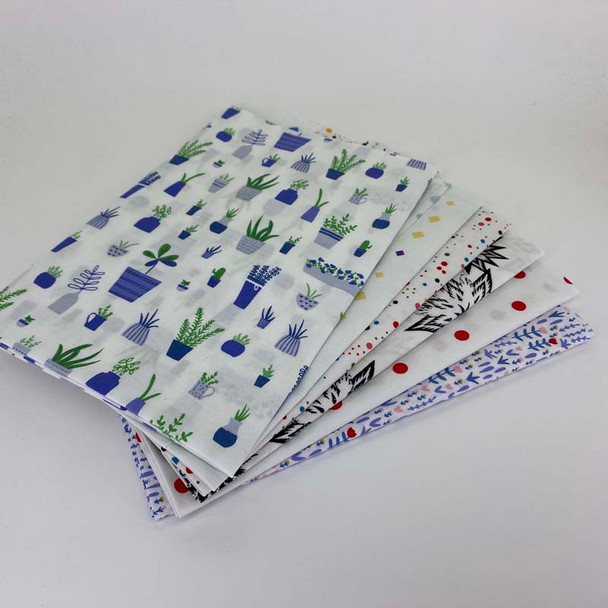 Folded White/Multi fat quarter fabric bundle