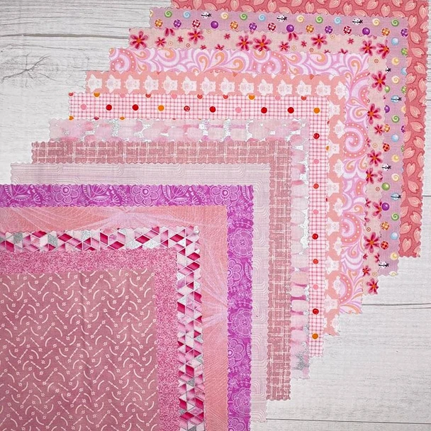 Stack of Pink 10-inch precut fabric squares