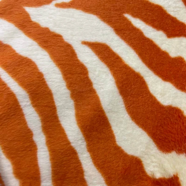 Orange Minkee Tween Zebra Stripe quilting fabric by Benartex