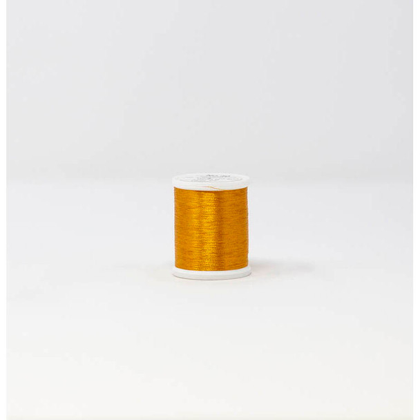 Madeira FS Metallic 985-4026 Amber thread spool on white background