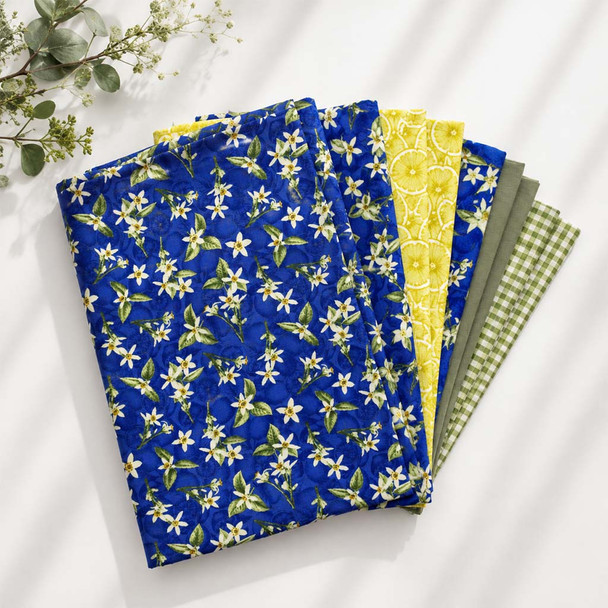 Lemon Blossom fabric bundle in blue, yellow, green, and botanical prints