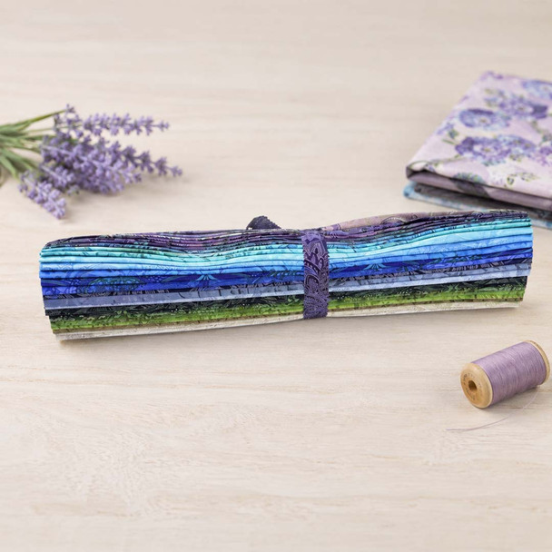 RJR Maison 27-piece fat quarter roll tied with purple ribbon