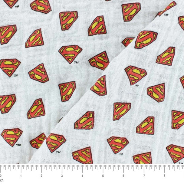 Double Gauze Cotton Swaddling Cloth featuring tossed Superman logos