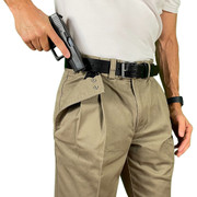 Close-up of a man drawing a gun from CCW Breakaways concealed carry TAN KHAKI shorts with an enlargeable opening to ensure a fast draw and no monkey-trapped hand in the pocket.