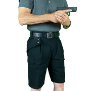 Man with drawn firearm wearing CCW Breakaways concealed carry BLACK CARGO shorts. The tactical shorts without the tactical appearance. The ideal ccw solution for pocket carry. Man with drawn firearm wearing CCW Breakaways concealed carry BLACK CARGO shorts. The tactical shorts without the tactical appearance. The ideal ccw solution for pocket carry.