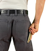 Man wearing CCW Breakaways concealed carry CHARCOAL GRAY JEANS shorts using the cell phone pocket to access his mobile phone. Man wearing CCW Breakaways concealed carry CHARCOAL GRAY JEANS shorts using the cell phone pocket to access his mobile phone.