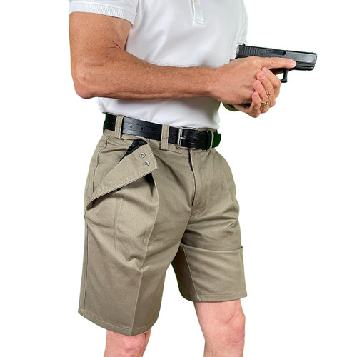 Man with drawn firearm wearing CCW Breakaways concealed carry TAN KHAKI shorts. The tactical shorts without the tactical appearance. The ideal ccw solution for pocket carry.