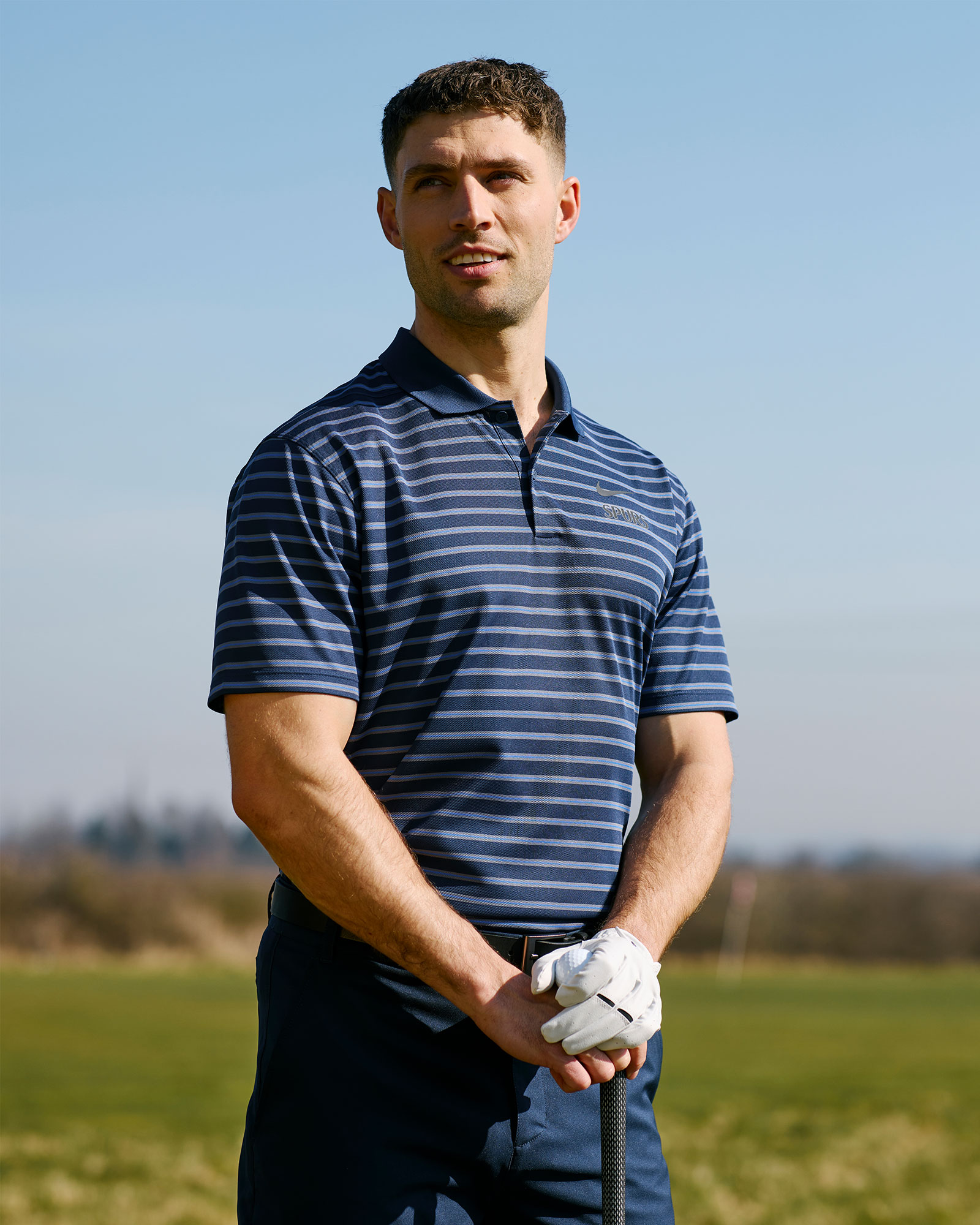 nike blue and white striped polo