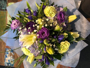 A pretty mix of flowers including purple and blue hues. A pretty mix of flowers including purple and blue hues.
