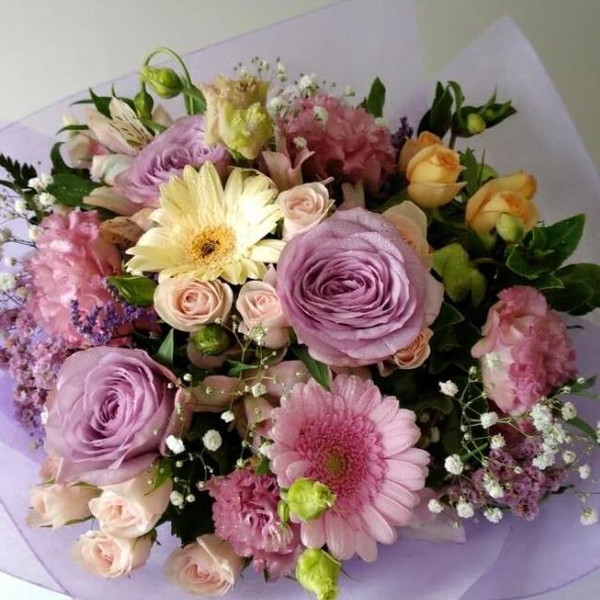 A pretty mix of soft coloured flowers