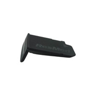 The SD card door is black with a short rectangular piece attached at the side to a longer flat piece. The Resmed logo is on the longer piece and on the shorter piece there is a slot for the SD card. 