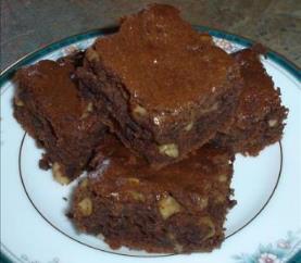 Honey Brownies cut into squares on a plate