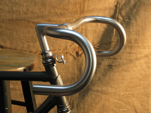 Nitto Grand Randonneur B132 Long ramps (flat section on top where the hands will go) on top with a 110 mm drop (to the bottom flat sections)
