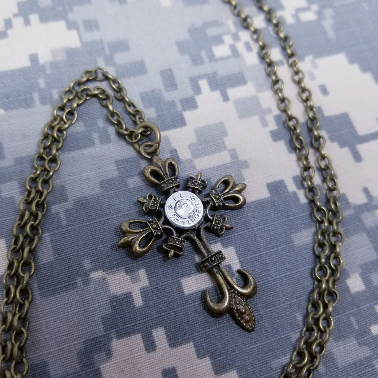 9mm Clear Silver Bullet Casing Bronze Cross Necklace Soo Charming