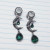  0g Silver Green Moon Dangle Screw Plugs / Tunnels