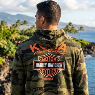 Back view of man wearing Harley-Davidson Men's Kona HD Original Zip Camo Hoodie near ocean coastline