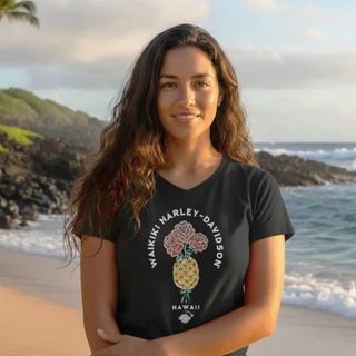 Front view of woman wearing black Harley-Davidson Aloha Made V-Neck Tee on Hawaiian beach