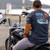 Rear view of Harley-Davidson Men's Kona Beach T-Shirt in Charcoal displaying beach motorcycle sunset back graphic