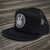 Side view of Harley-Davidson Eagle Crest Mesh Back Cap showing black mesh panels and flat visor profile
