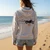 Back view of Harley-Davidson Women's Seaview Zipper Hooded Jacket showing Honolulu Harley-Davidson coastal back graphic