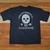 Rear view of Harley-Davidson Men's BadMan T-Shirt in Overdye Black displaying stark-white skull and Honolulu Hawaii back graphic