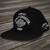 Harley-Davidson 1959 Aloha Flat Cap in Black featuring custom Honolulu Harley-Davidson Hawaii front graphic