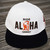 Harley-Davidson Ride Aloha Flat Cap in White and Black featuring custom Hawaii front graphic.