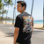 Rear view of Harley-Davidson Men's Tiki Waikiki T-Shirt in White displaying carved tiki back graphic