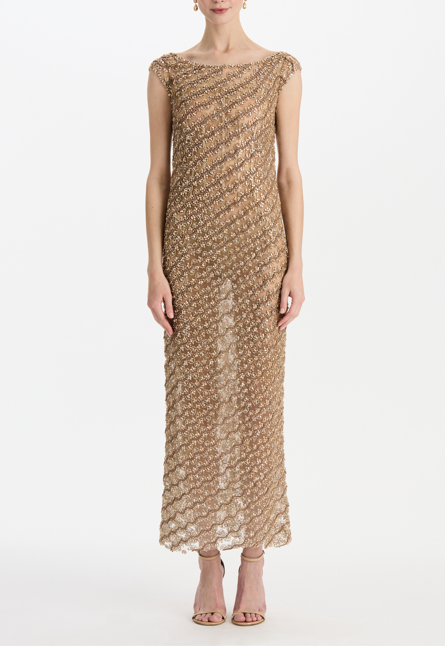 oscar de la renta gold sequin dress Golden goddess. @gemma_chan wore the #odlrprespring2022 gold sequin gown  with custom train for the closing ceremony of the 74th Annual  @festivaldecannes. #cannes2021 #cannes