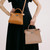 Michino Leather Handbag Lutece Mini in Tourterelle