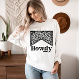 Howdy DTF Heat Transfer, woman wearing white sweatshirt with leopard print design and the word 'Howdy' on it.